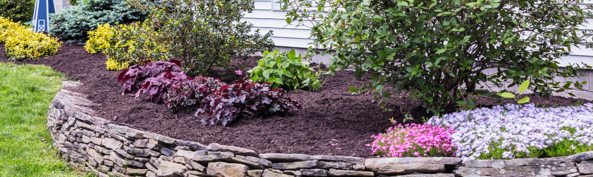 residential landscaping with rubber mulch